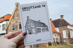Grootzand 78 Sneek postcard held in front of the building