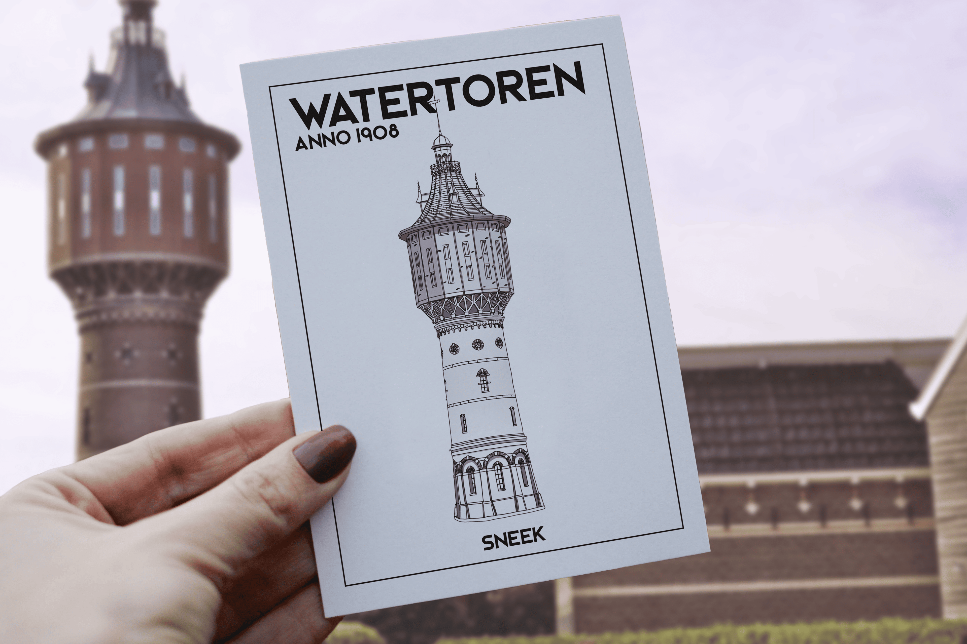 Watertoren Sneek postcard held in front of the tower